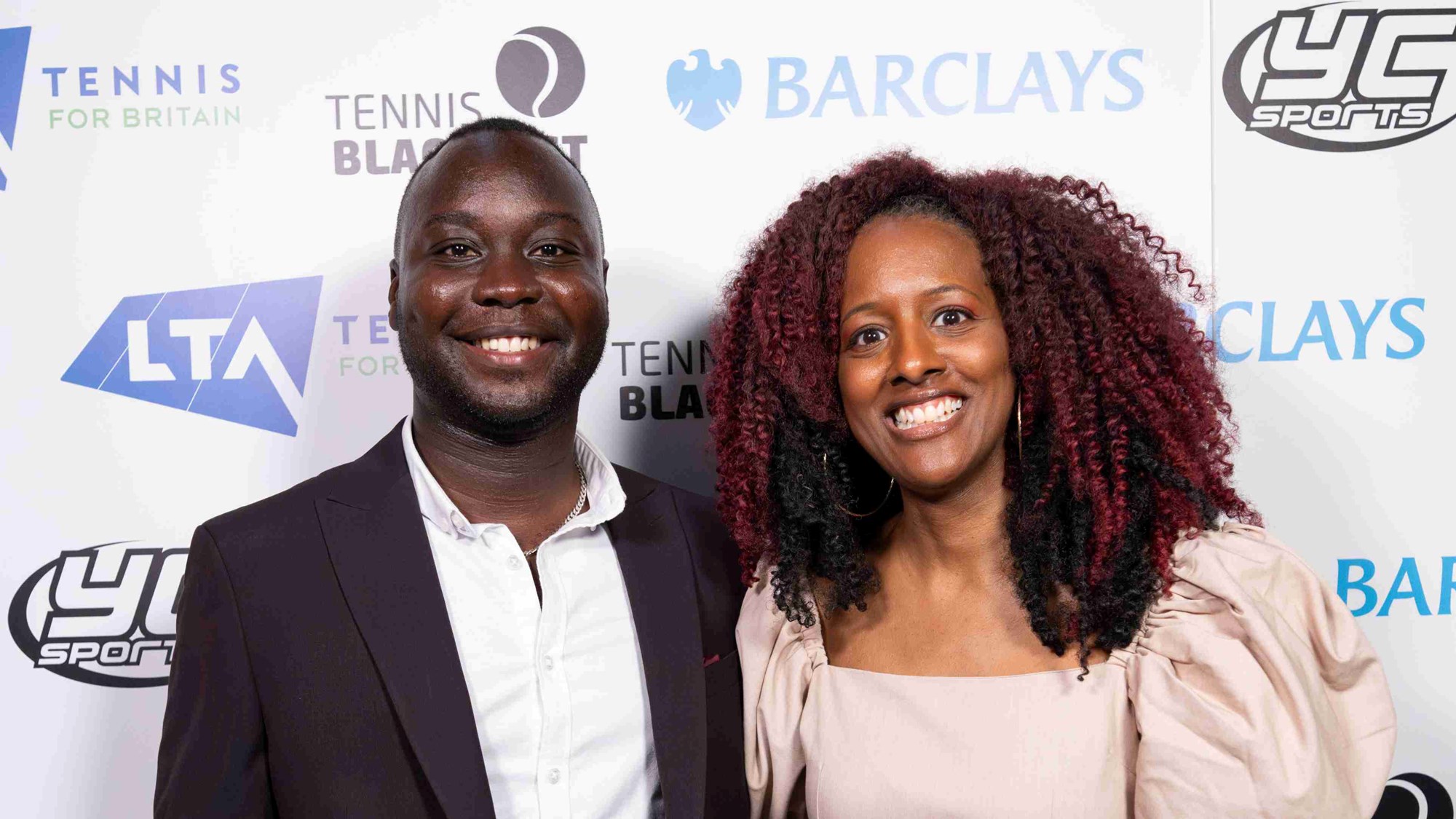 Tennis Black List Organisers Anne Marie Batson and Richard Sackey Addo smiling next to each other