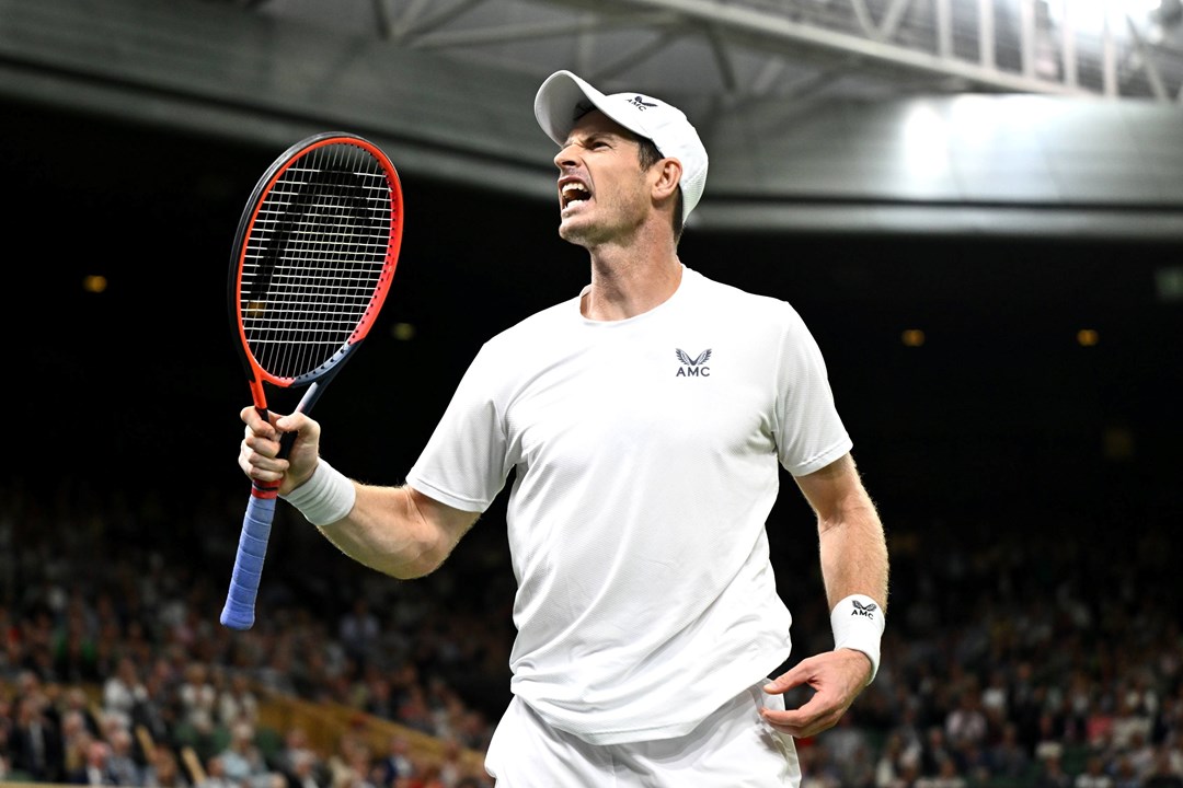 Andy Murray celebrates winning the third set against Stefanos Tsitsipas at Wimbledon