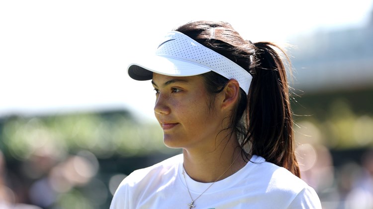 Emma Raducanu looks on during training at Wimbledon
