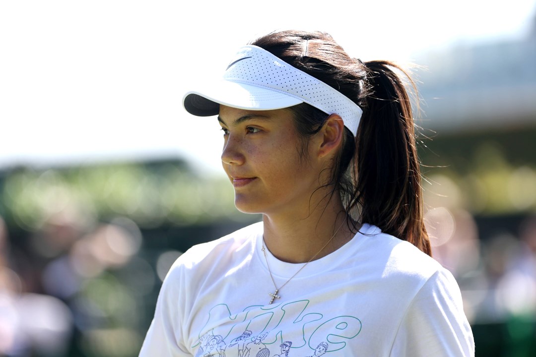 Emma Raducanu looks on during training at Wimbledon