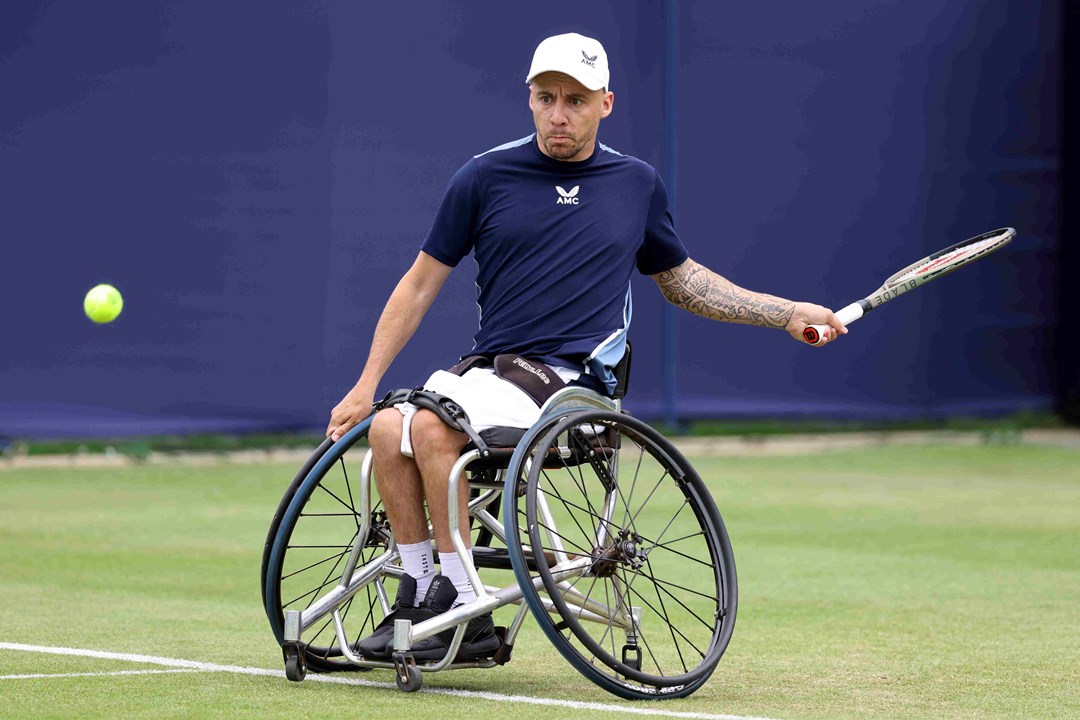 Andy Lapthorne lining up to his a forehand in his wheelchair on court at the Rothesay International