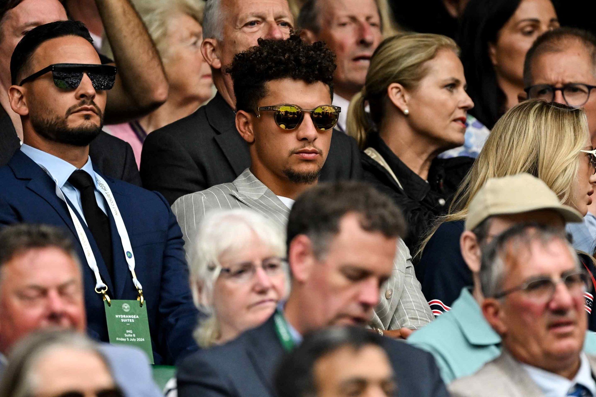 Patrick Mahomes sat amongst the crowd at Wimbledon while wearing sunglasses