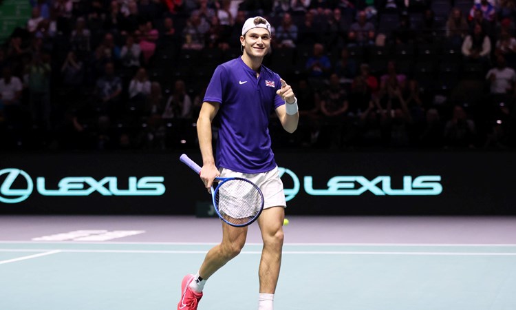 Jack Draper points to the crowd after winning his first Davis Cup match in Manchester