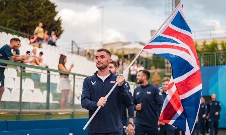 Christian Medina Murphy carrying the GB flag at the 2024 European Padel Championships