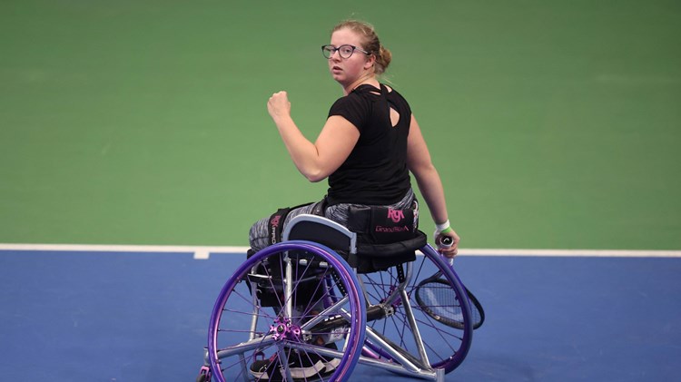 Abbie Breakwell celebrates winning a point at the Bolton ITF 3 wheelchair tennis tournament