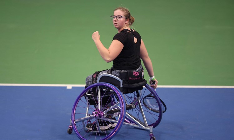 Abbie Breakwell celebrates winning a point at the Bolton ITF 3 wheelchair tennis tournament