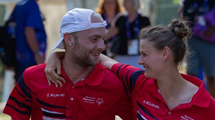 Great Britain's Matthew Brough (L) and Lily Mills (R)  celebrating winning Gold in the Mixed Doubles Level 6 event at the 2023 Special Olympics held in Berlin (Photo by Ken Hanrahan Smith, Katz Wizkas Photography)
