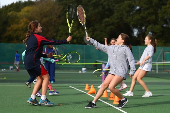 Children playing tennis