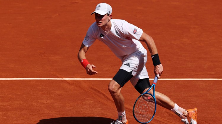 Jack Draper moving to hit a ball on a clay court