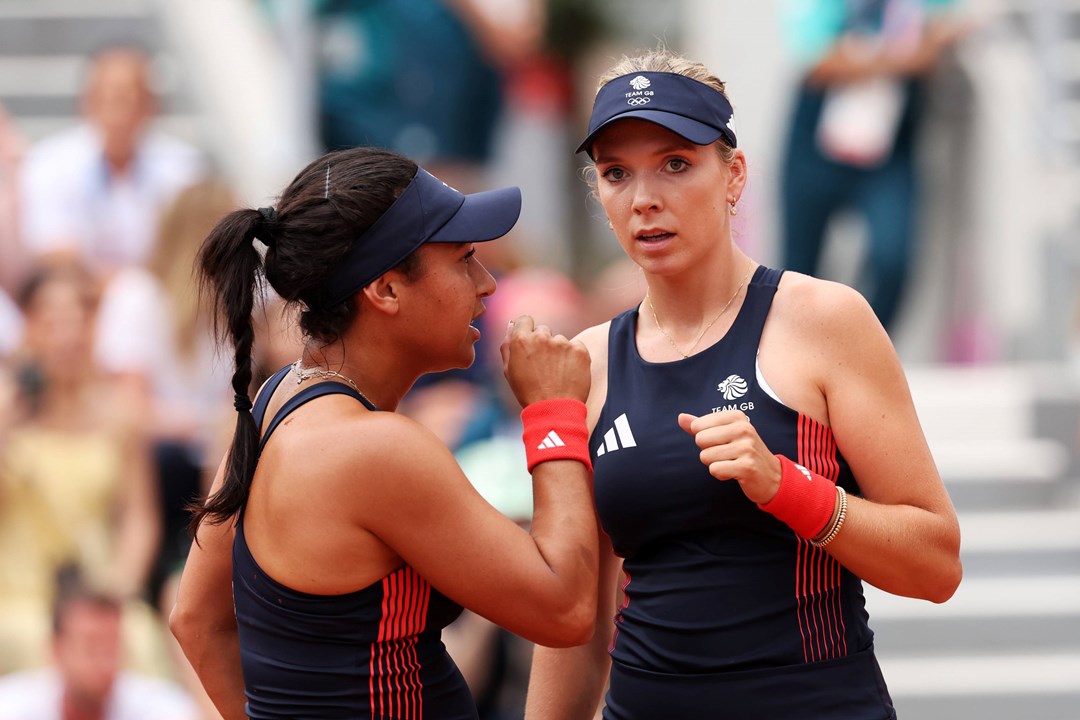 Heather Watson and Katie Boulter interacting on courtt during the women's doubles at the Olympics