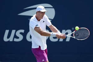 Jan Choinski hits a backhand on his main draw debut at the US Open