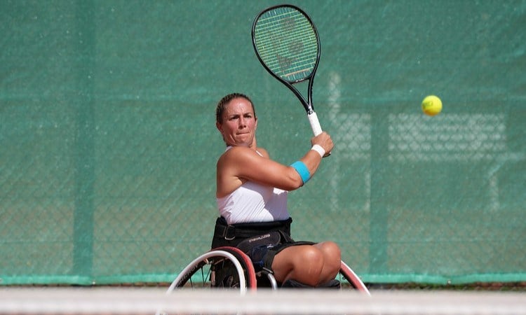 Lucy Shuker hitting a backhand in practice at the Paralympics