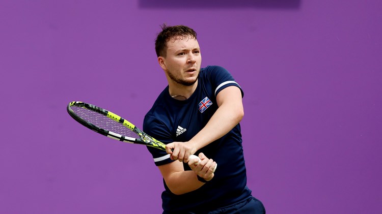 Fabrice Higgins of Great Britain plays a backhand against Mitchell James of Australia during the Learning Disability Singles match on Day Six of the cinch Championships at The Queen's Club on June 22, 2024 in London, England. 