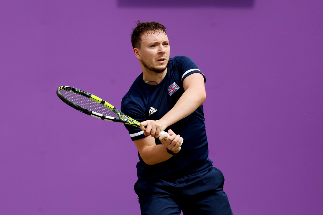 Fabrice Higgins of Great Britain plays a backhand against Mitchell James of Australia during the Learning Disability Singles match on Day Six of the cinch Championships at The Queen's Club on June 22, 2024 in London, England. 