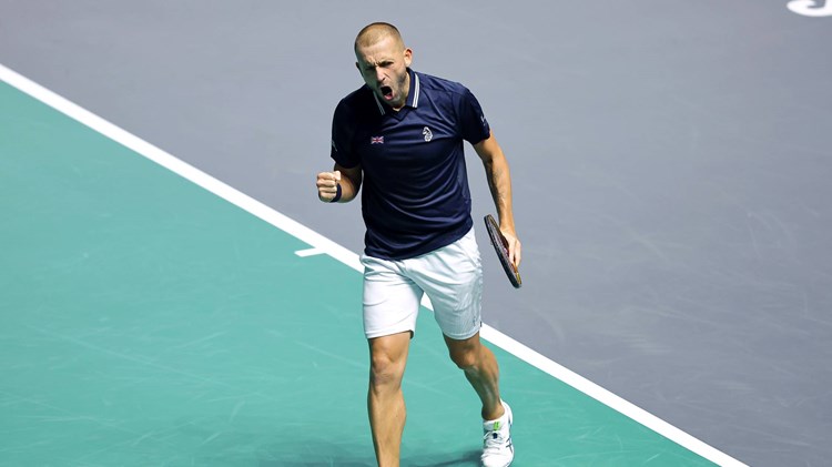 Dan Evans celebrates a singles victory against Finland at the Davis Cup