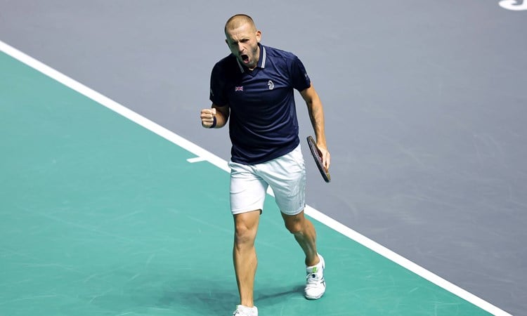 Dan Evans celebrates a singles victory against Finland at the Davis Cup