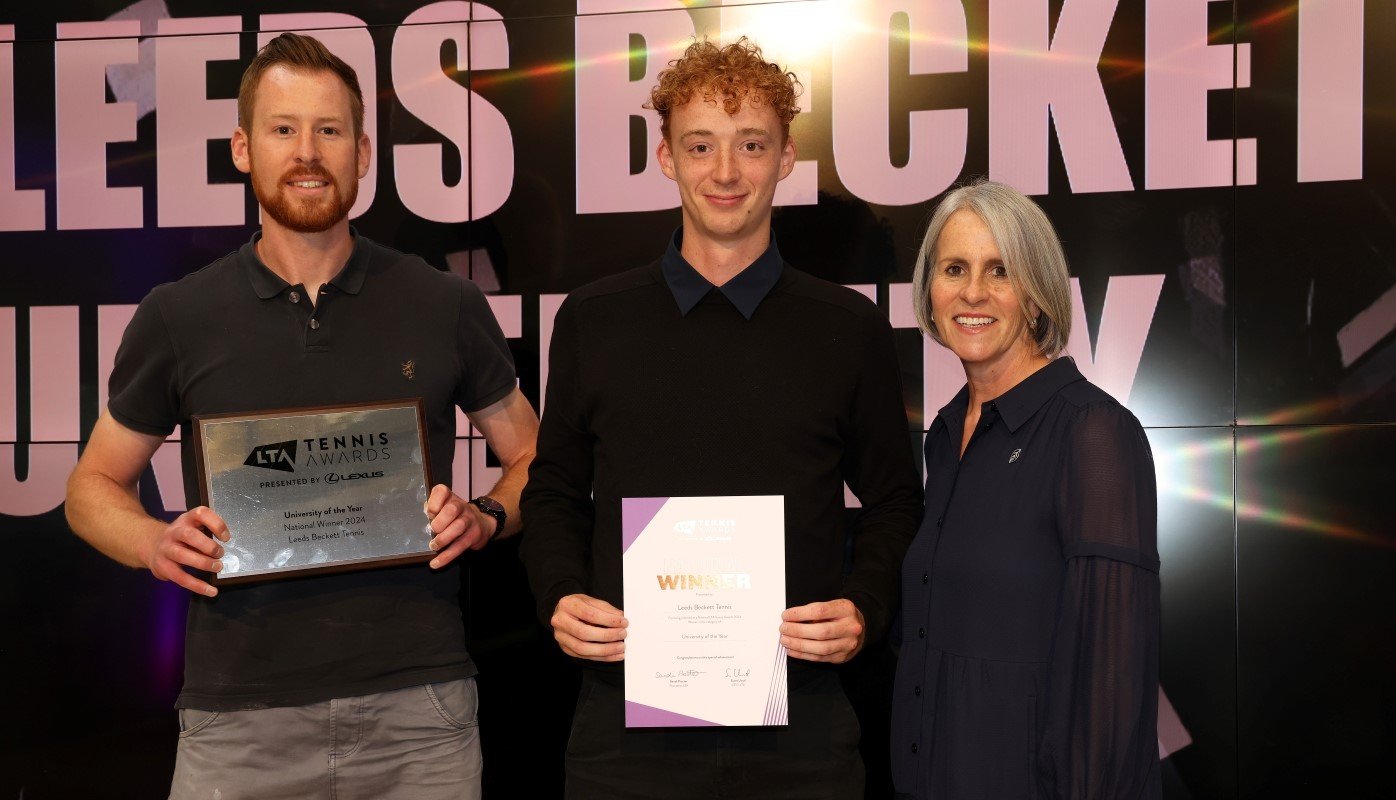 Leeds Beckett representatives posing with their University of the Year award