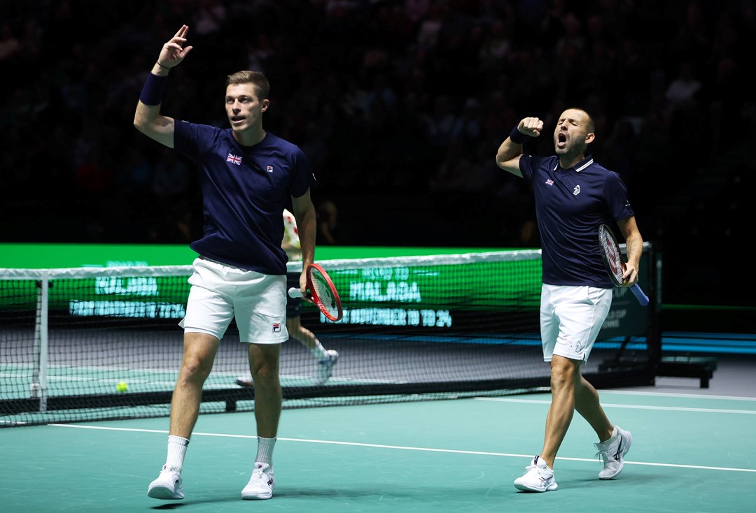 Neal Skupski & Dan Evans celebrate a win against Argentina in the final doubles rubber at the Davis Cup