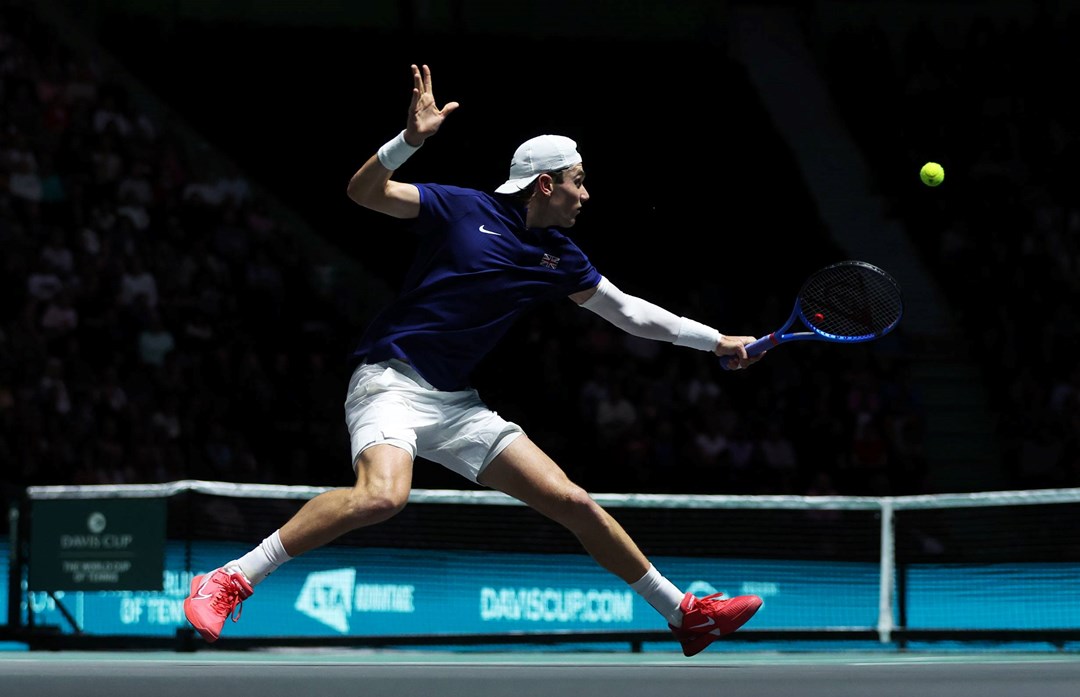 Jack Draper stretches for a backhand against Felix Auger-Aliassime at the Davis Cup