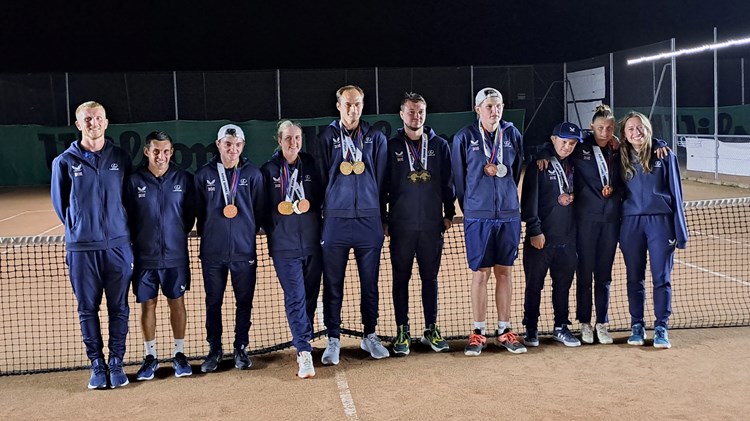 Great Britain's Learning Disability team pictured side by side on court after winning a total 11 medals at the 2024 Virtus World Championships in Annecy, France