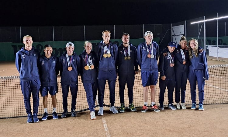 Great Britain's Learning Disability team pictured side by side on court after winning a total 11 medals at the 2024 Virtus World Championships in Annecy, France