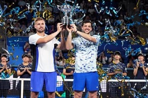 Lloyd Glasspool and Julian Cash holding the Tokyo Open men's doubles title