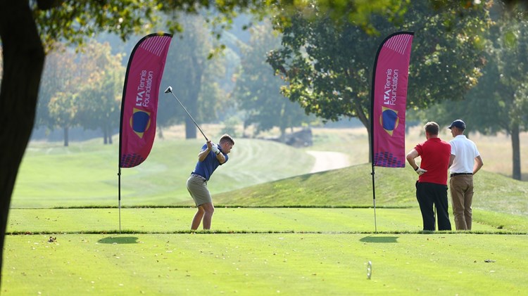 Neal Skupski teeing off at Hole 1 LTA Tennis Foundation Golf Day 