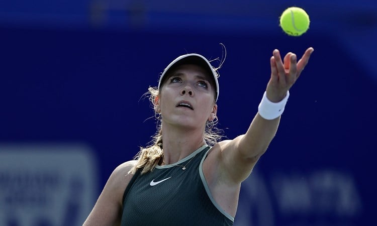 British tennis player Katie Boulter serving during her first round match against Leisa Tsurenko at the Wuhan Open