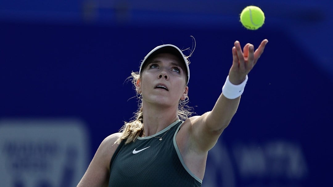 British tennis player Katie Boulter serving during her first round match against Leisa Tsurenko at the Wuhan Open