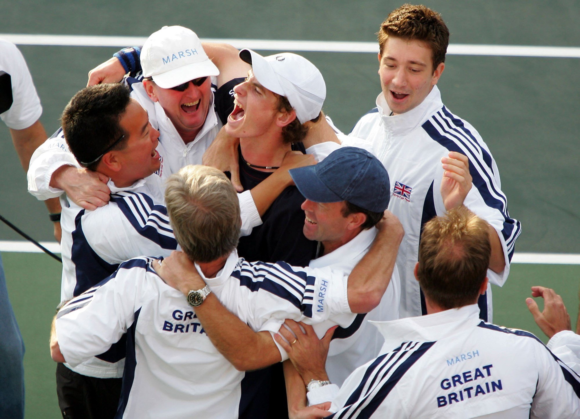 Andy Murray celebrates with the Great Britain Davis Cup team after beating Israel on his debut in 2005