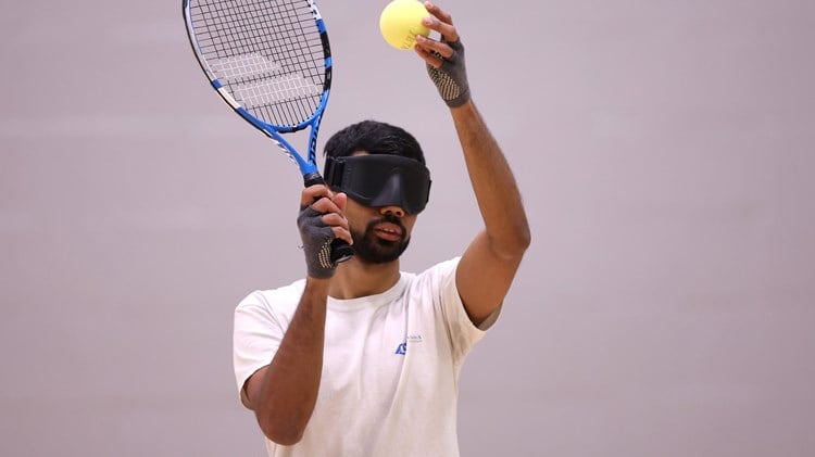 aqi Rizi plays against Roy Turnham during Visually Impaired Tennis National Finals 2022 match at Wrexham Tennis Centre on November 20, 2022 in Wrexham, Wales.