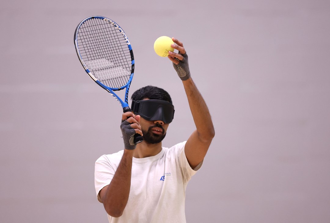 aqi Rizi plays against Roy Turnham during Visually Impaired Tennis National Finals 2022 match at Wrexham Tennis Centre on November 20, 2022 in Wrexham, Wales.