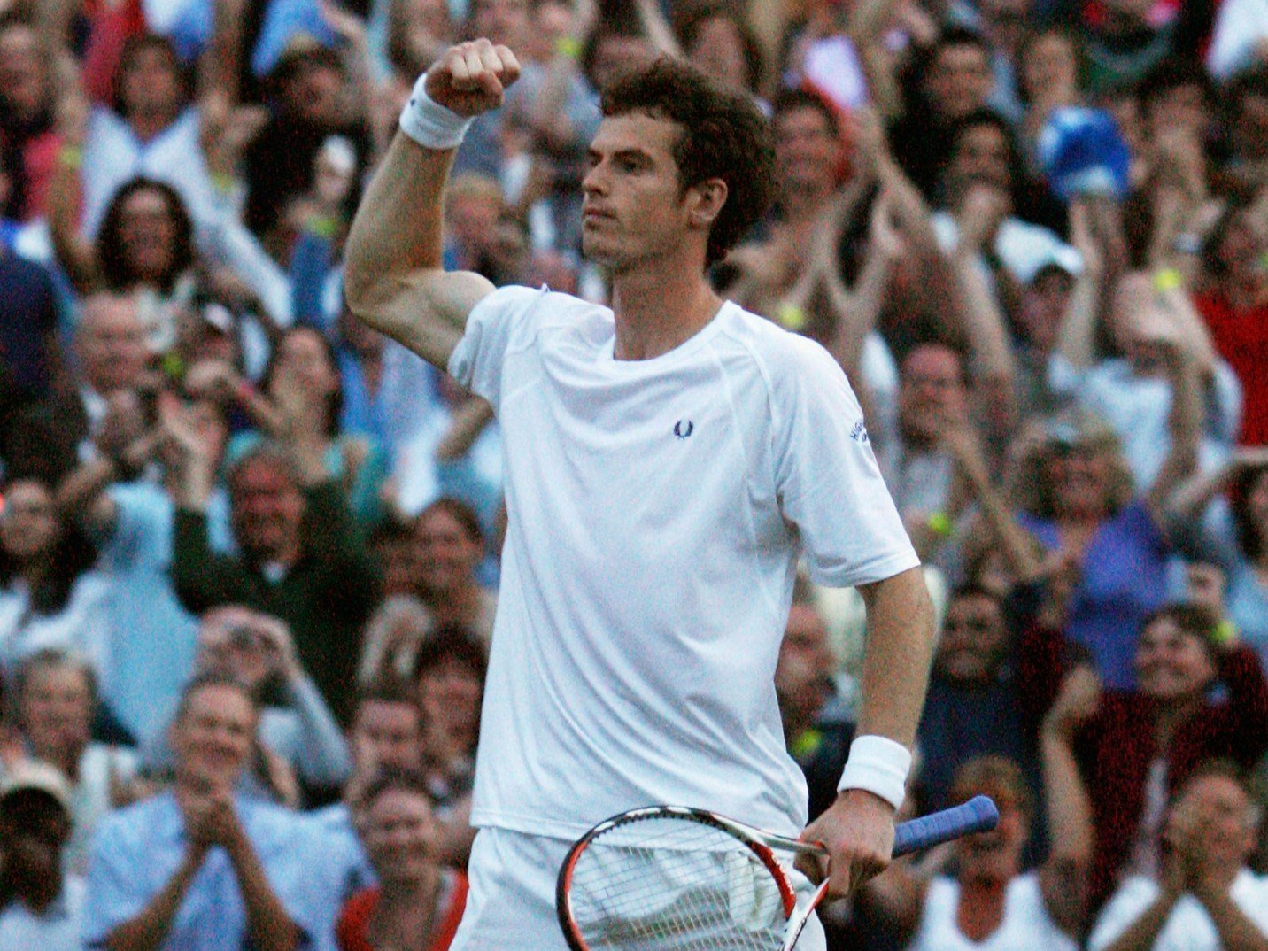 Andy Murray celebrates winning the men's singles round four match against Richard Gasquet at Wimbledon 2008