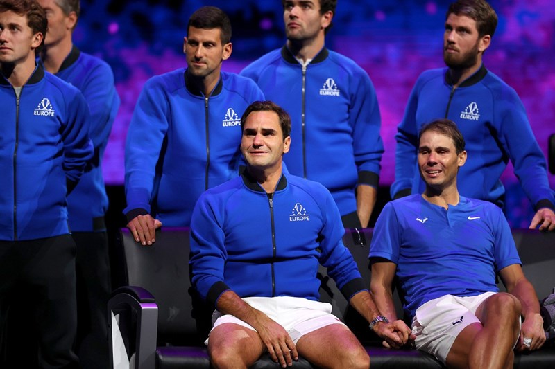 Roger Federer and Rafael Nadal hold hands at the Laver Cup