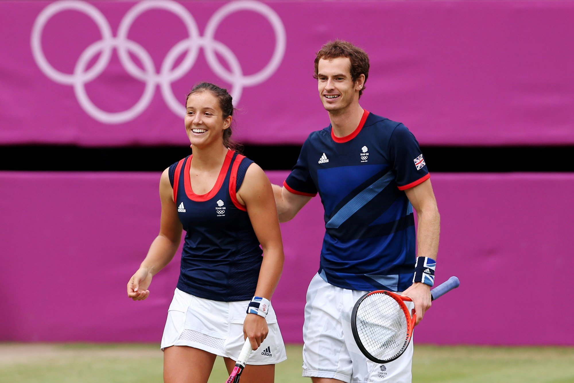 Laura Robson and Andy Murray smiling on court whilst representing Team GB at the 2012 London Olympic Games