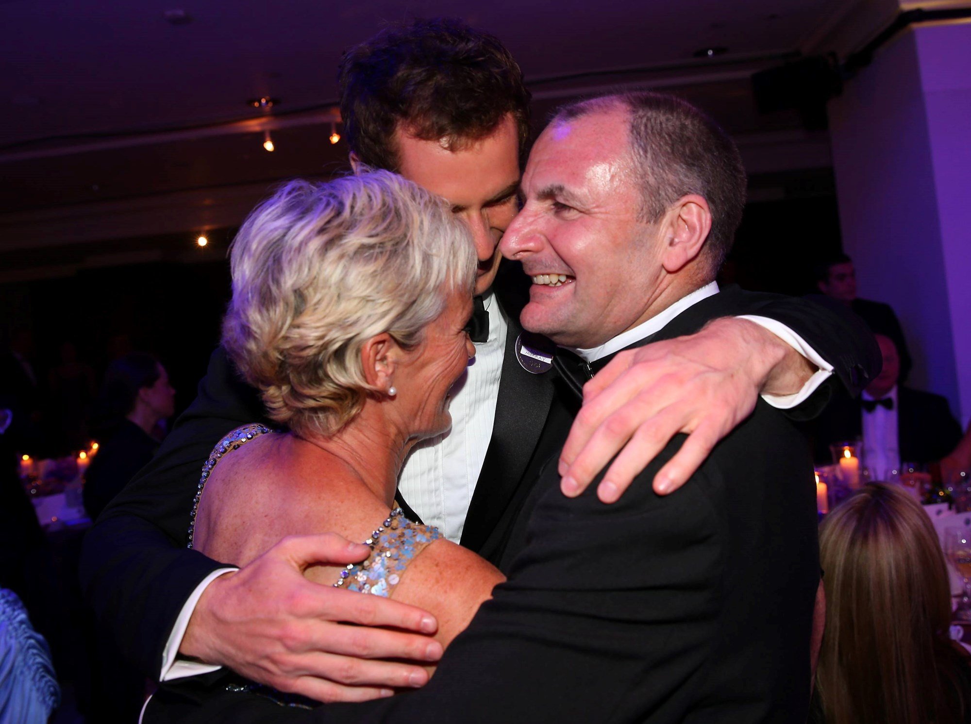 2013 Wimbledon men's singles champion Andy Murray hugs parents Judy Murray and William Murray during the Wimbledon Winners Ball