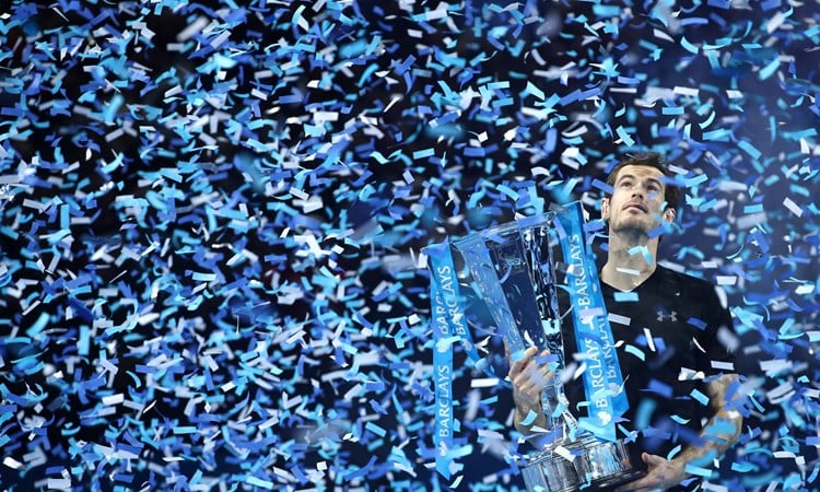 Andy Murray lifts the ATP World Tour Finals trophy in 2016 after defeating Novak Djokovic in the final at the O2 Arena