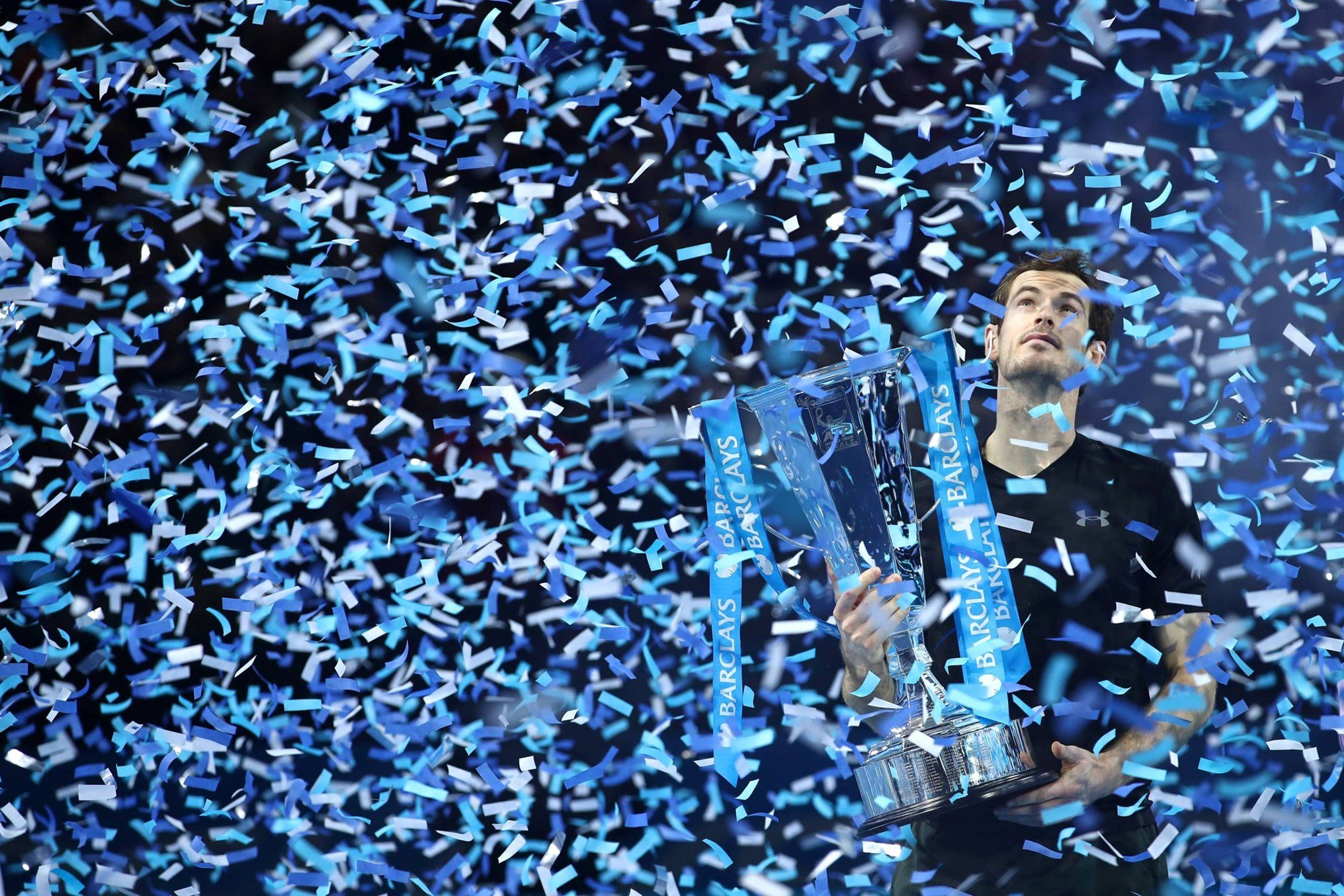 Andy Murray lifts the ATP World Tour Finals trophy in 2016 after defeating Novak Djokovic in the final at the O2 Arena