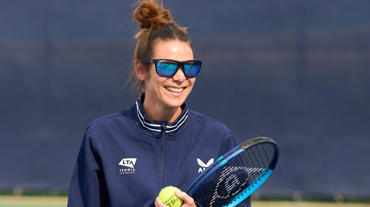 Tennis coach wearing Coral Eyewear