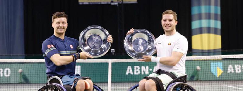 Alfie Hewett and Gordon Reid with their trophy in Rotterdam