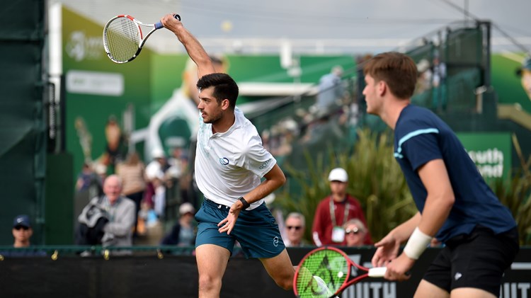 Julian Cash reacting during the men's doubles final at the 2022 Rothesay Open, Nottingham