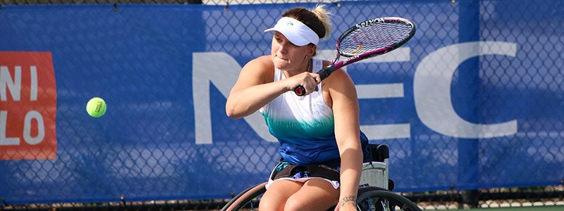 Jordanne Whiley hits a backhand at the 2019 NEC Wheelchair Singles