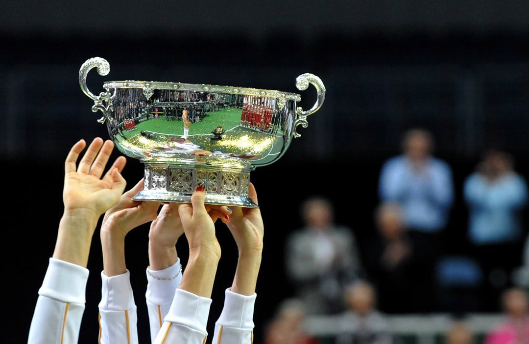 Members of the Czech Fed Cup Tennis team hold the trophy of the International Tennis Federation Fed Cup on November 4, 2012, in Prague.