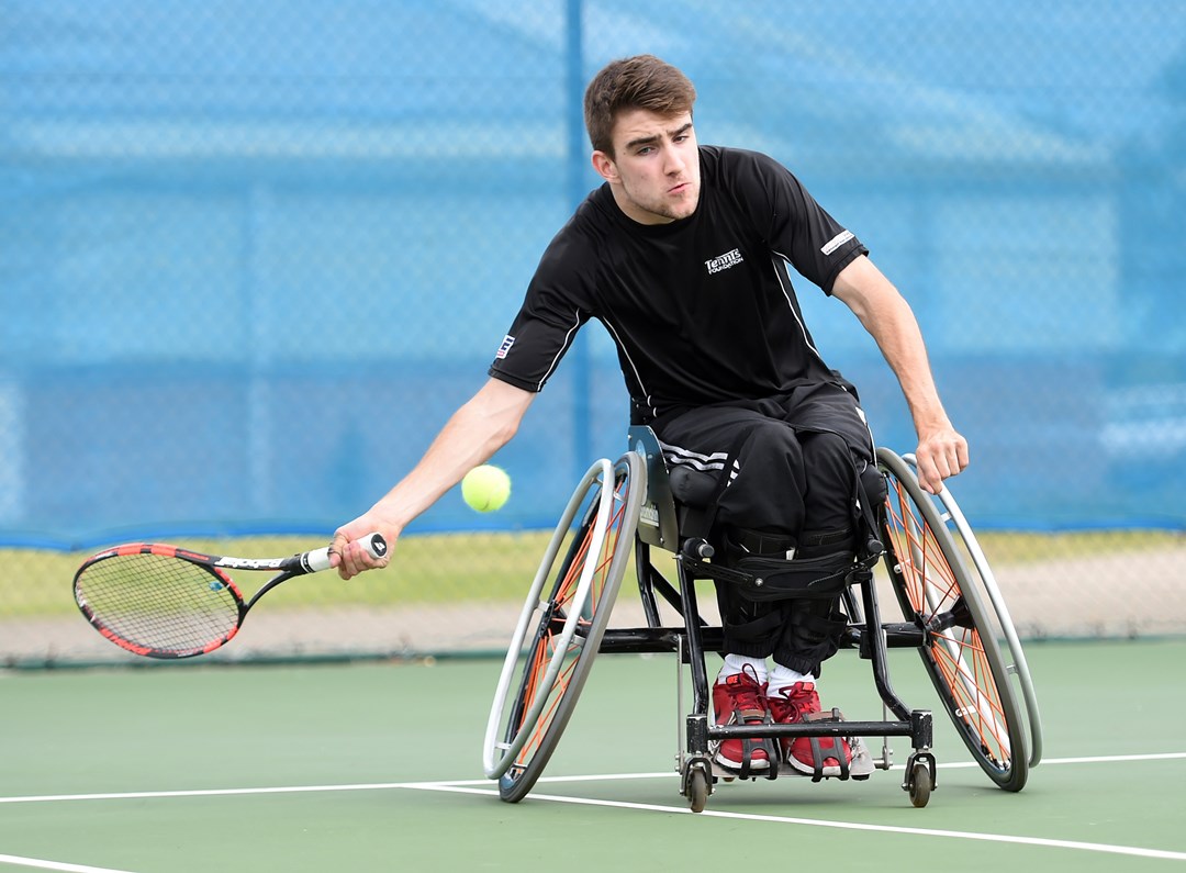 James Shaw hits a forehand