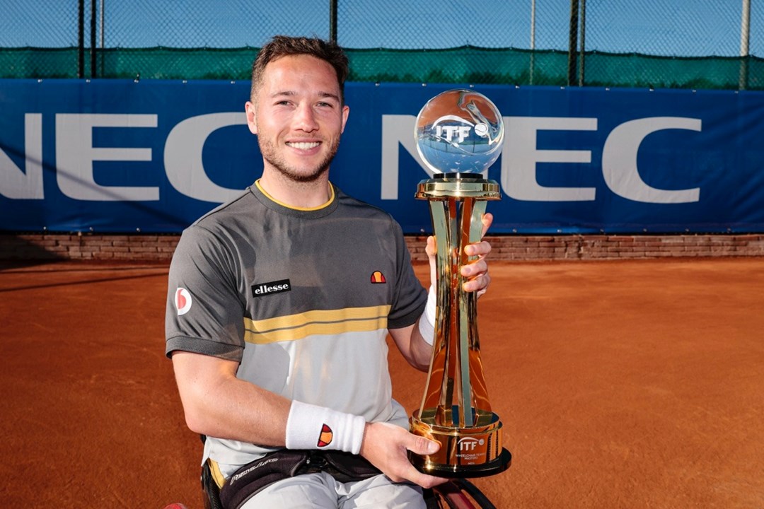 Great Britain's Alfie Hewett holding the Wheelchair Tennis Masters singles title