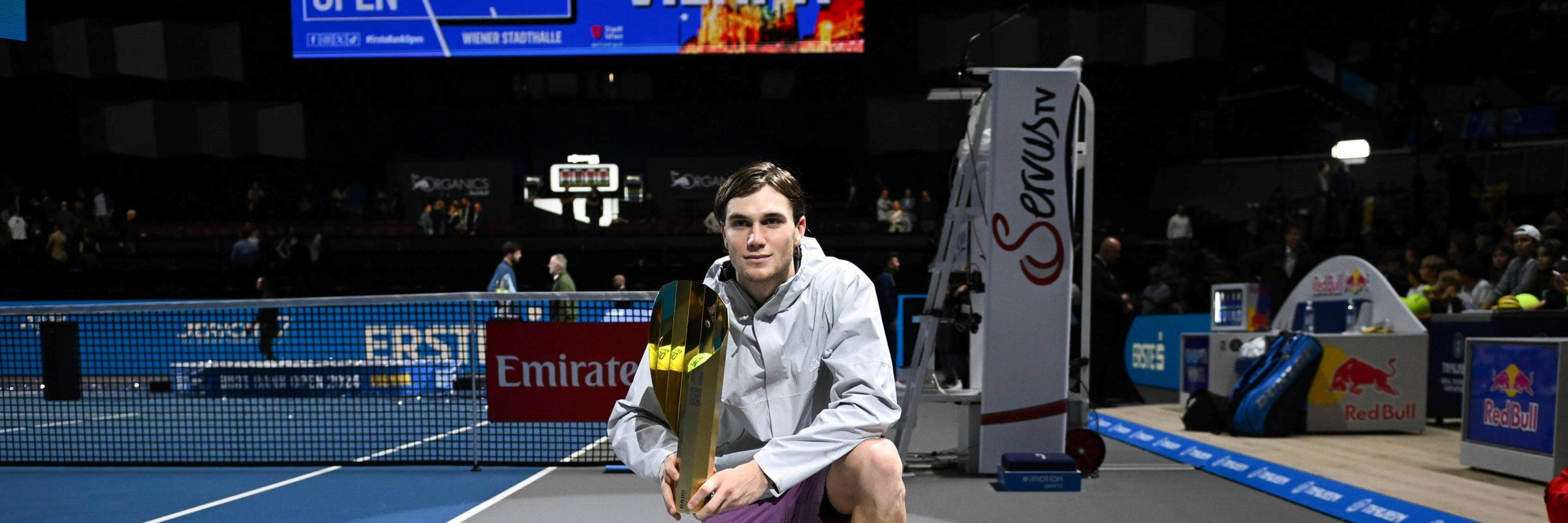 Jack Draper poses with the biggest trophy of his career to date at the ATP 500 Erste Bank Open in 2024