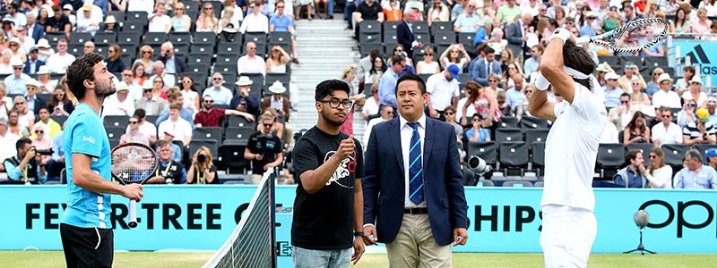 Feliciano Lopez and Giles Simon with StreetGames performing a coin toss at the 2019 Queen's Championships