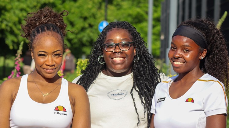 Tennis coaches and SheCanServe co-founders Memuna Koroma (L), Rushan Tonge-Bobia, and Angela Zamara (R) pictured during a SheCanServe event.