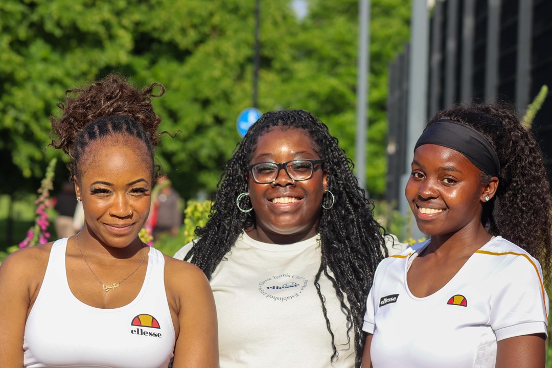 Tennis coaches and SheCanServe co-founders Memuna Koroma (L), Rushan Tonge-Bobia, and Angela Zamara (R) pictured during a SheCanServe event.