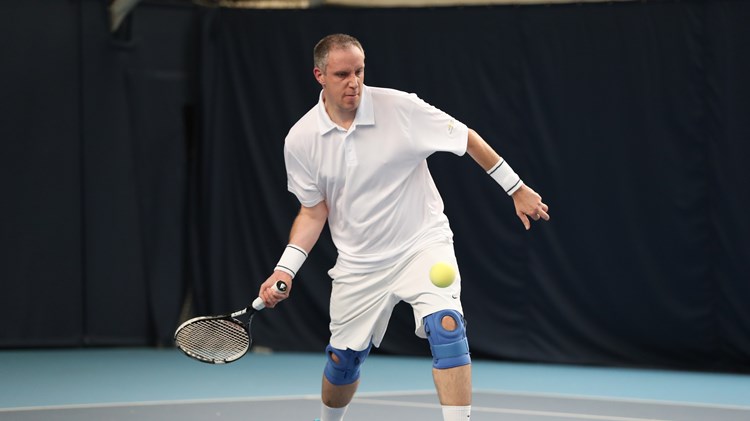 Chris Baily hitting a forehand